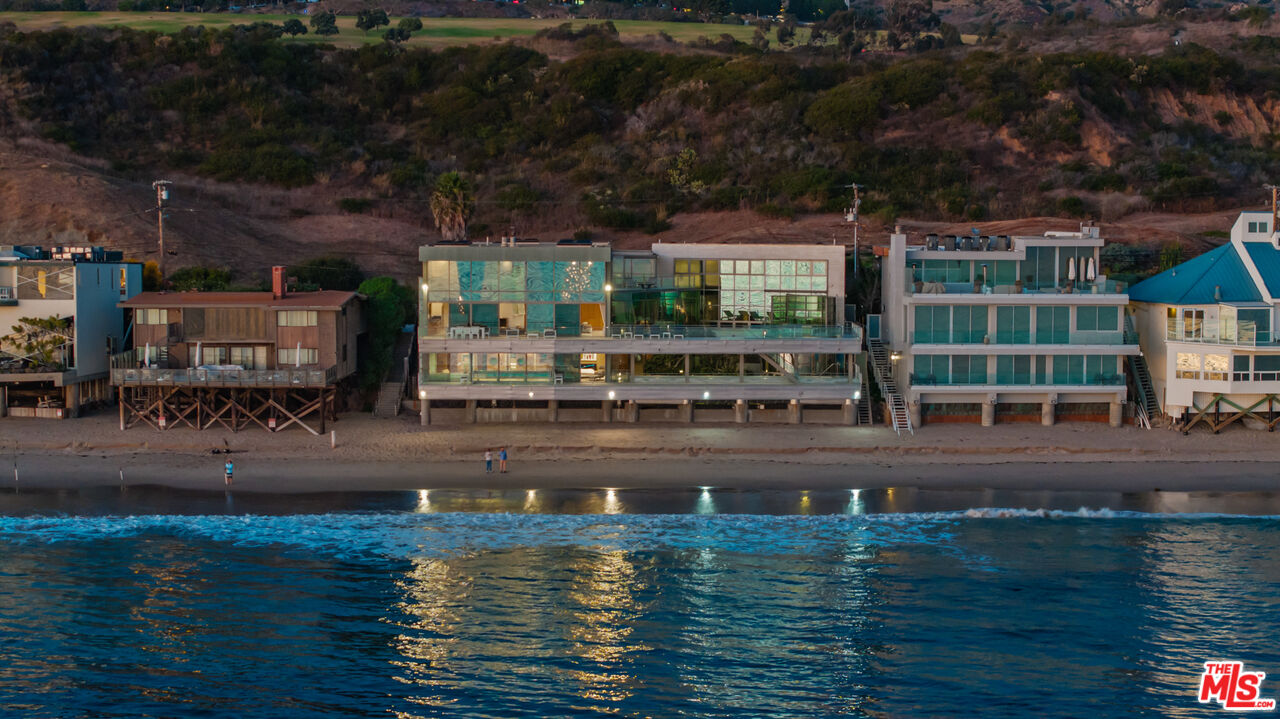 24434 Malibu Road Malibu, CA 90265 - Photo 25 of 29 a swimming pool view with a lake view