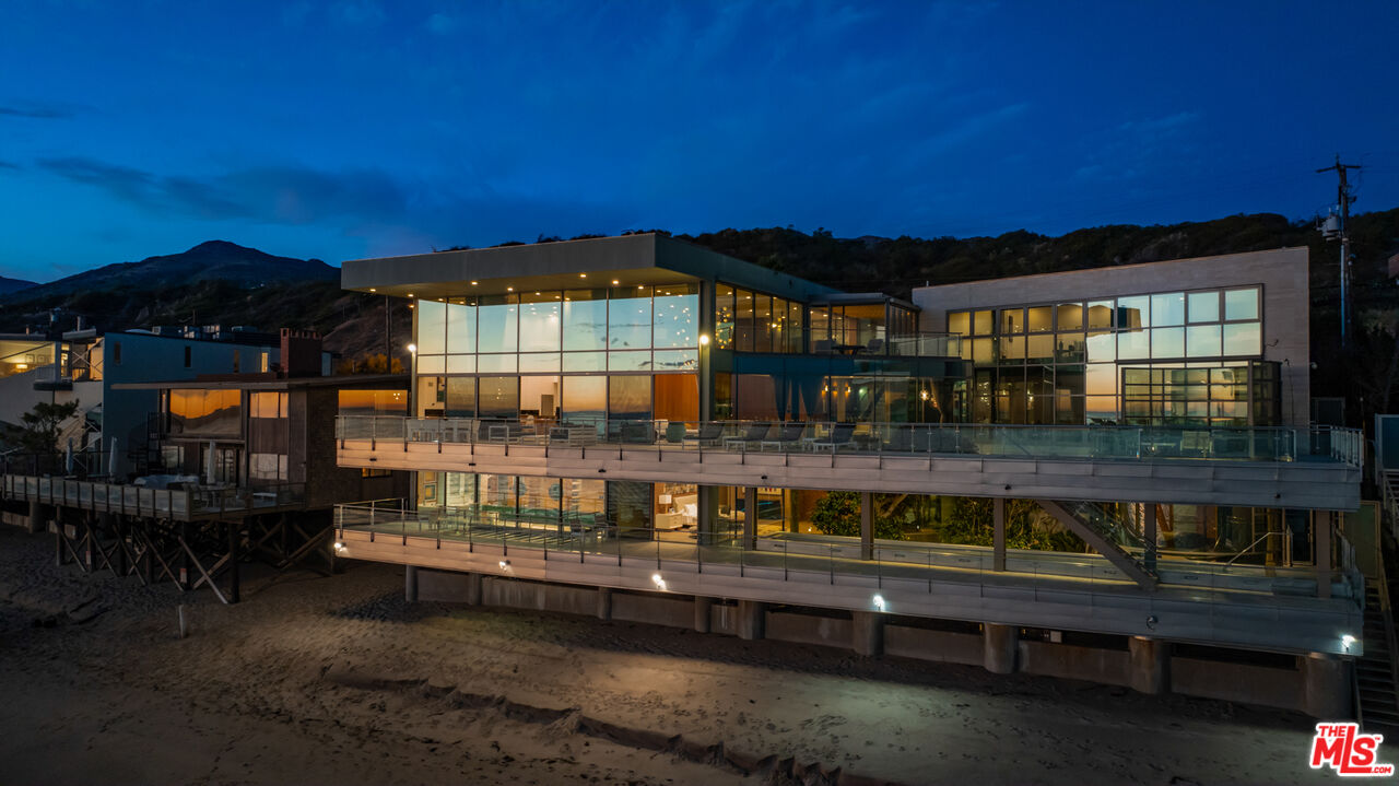24434 Malibu Road Malibu, CA 90265 - Photo 28 of 29 a front view of a house with a yard