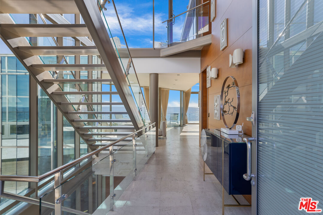24434 Malibu Road Malibu, CA 90265 - Photo 6 of 29 a view of entryway and hall with wooden floor