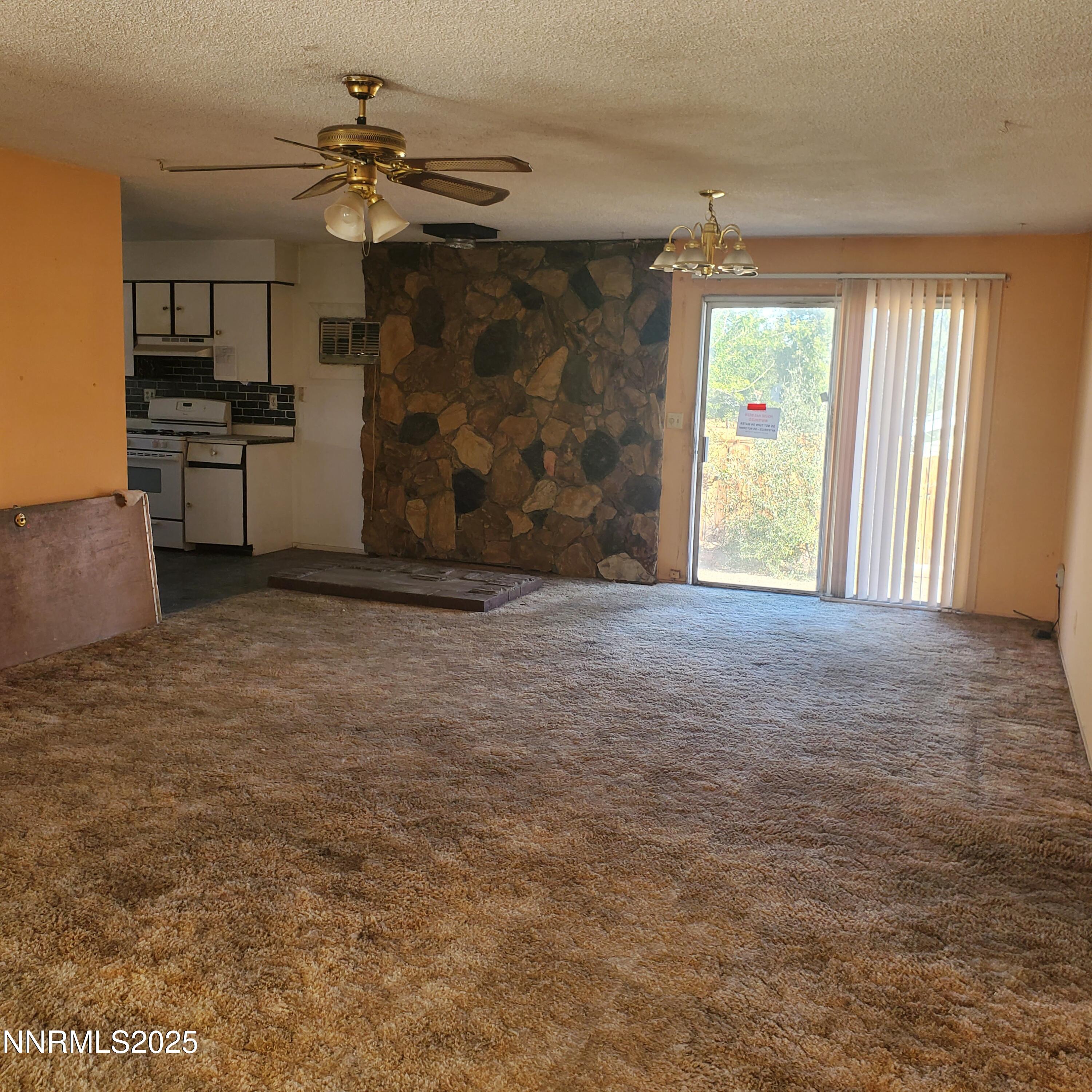 315 Pine Street Hawthorne, NV 89415 - Photo 4 of 6 a view of a kitchen with a sink and a window