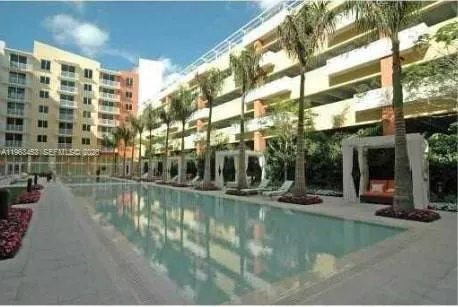a view of pool with outdoor seating