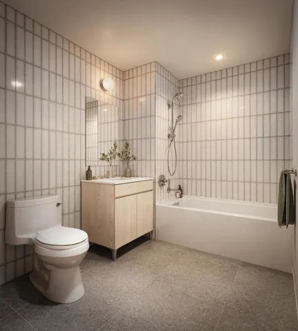 a bathroom with a sink toilet and bathtub