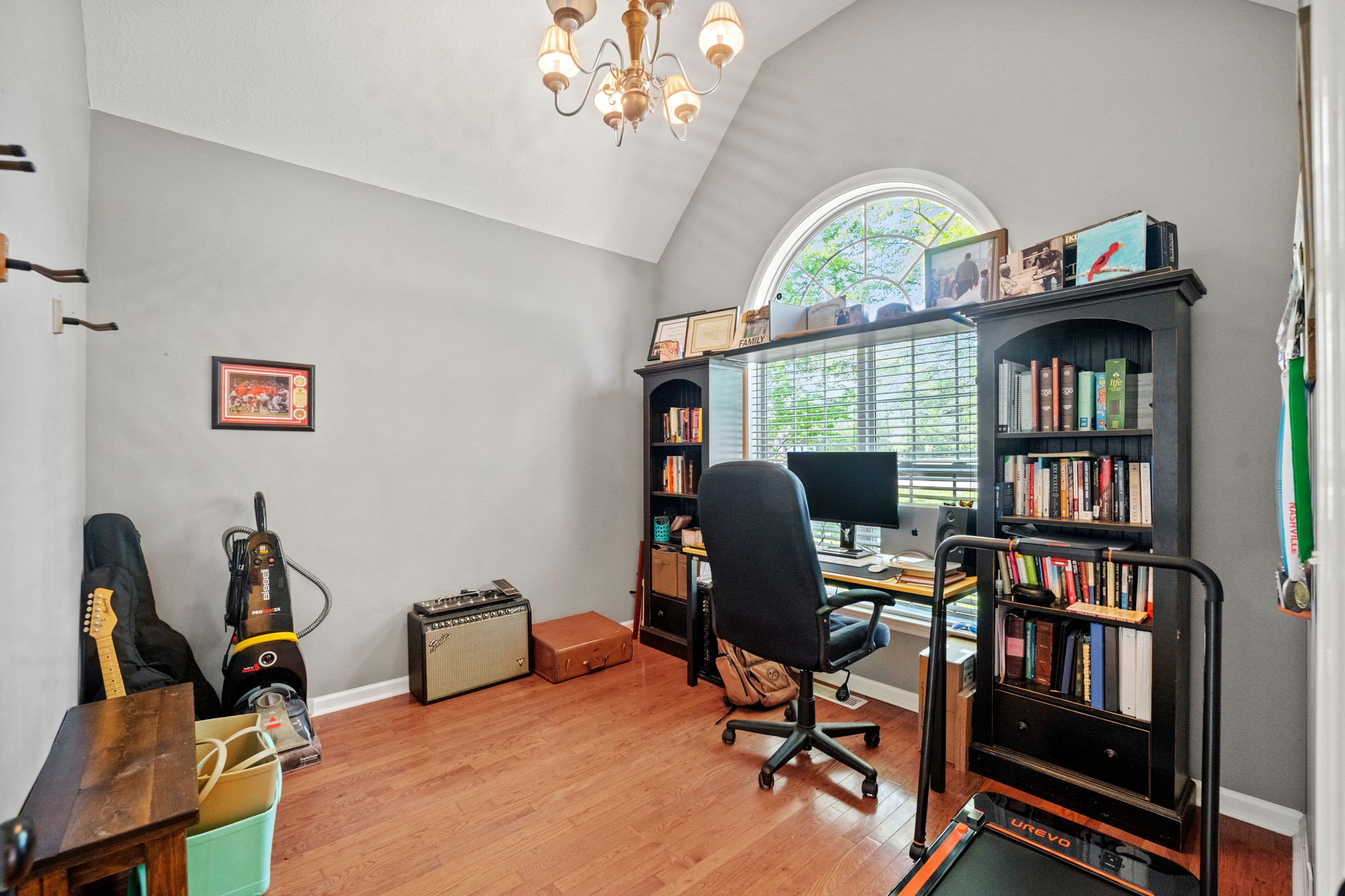 101 Lorelle Circle Portland, TN 37148 - Photo 12 of 21 a view of a workspace with a bookshelf and a workspace