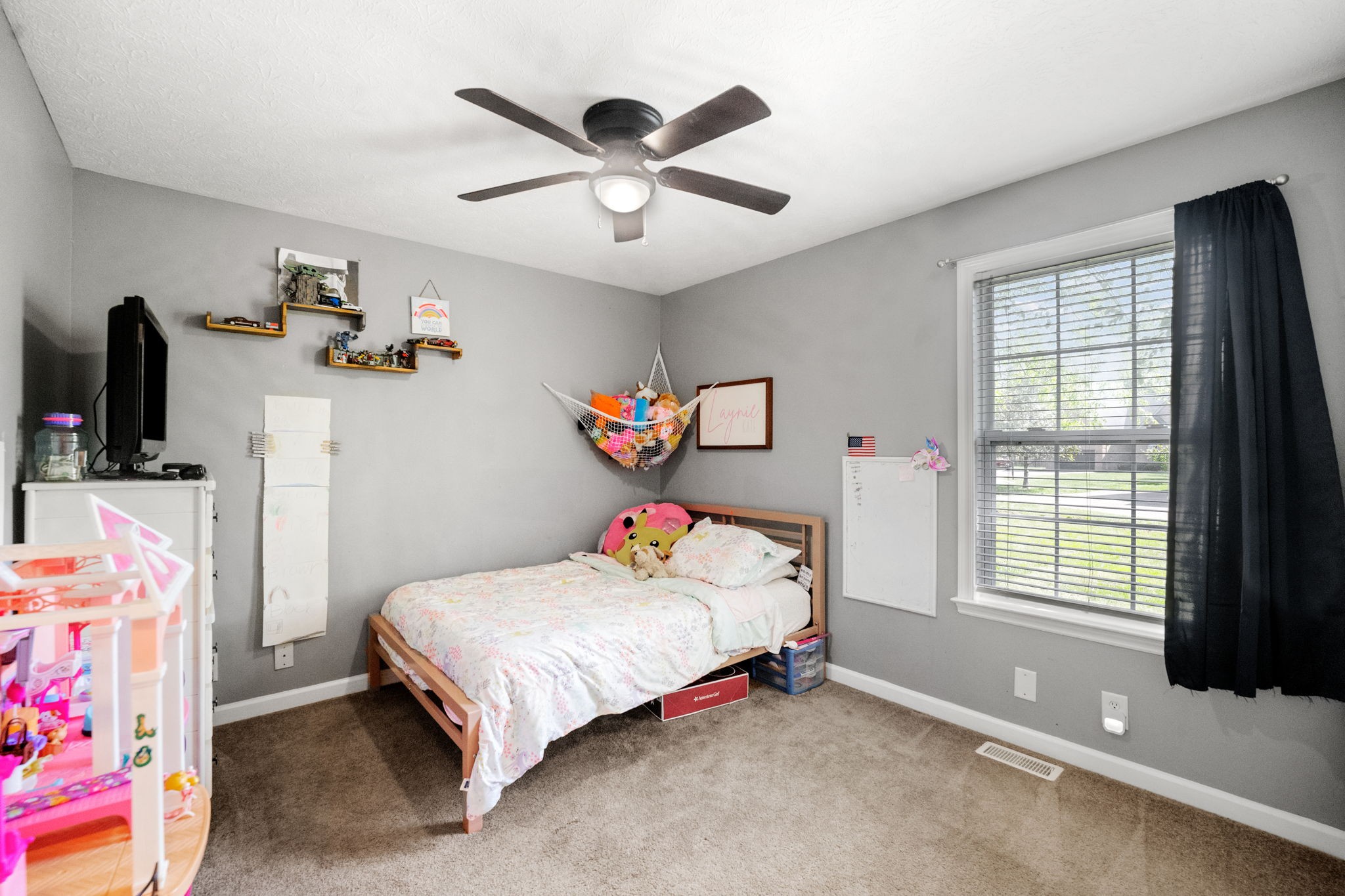 101 Lorelle Circle Portland, TN 37148 - Photo 16 of 21 a bedroom with a bed and a window