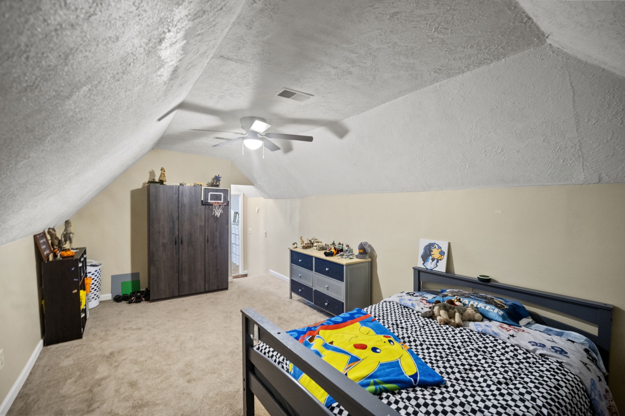 101 Lorelle Circle Portland, TN 37148 - Photo 20 of 21 a bed sitting in a bedroom next to a window