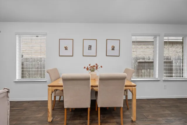 a bedroom with bed and window
