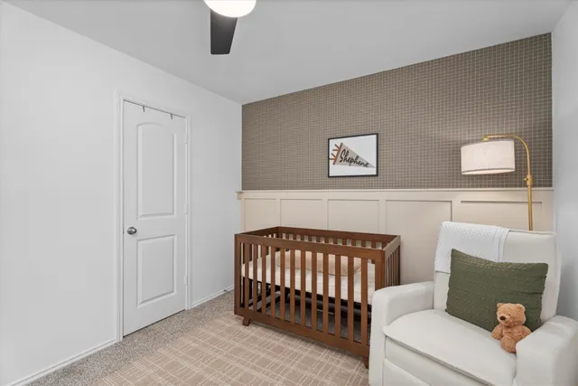 a bedroom with furniture and a window