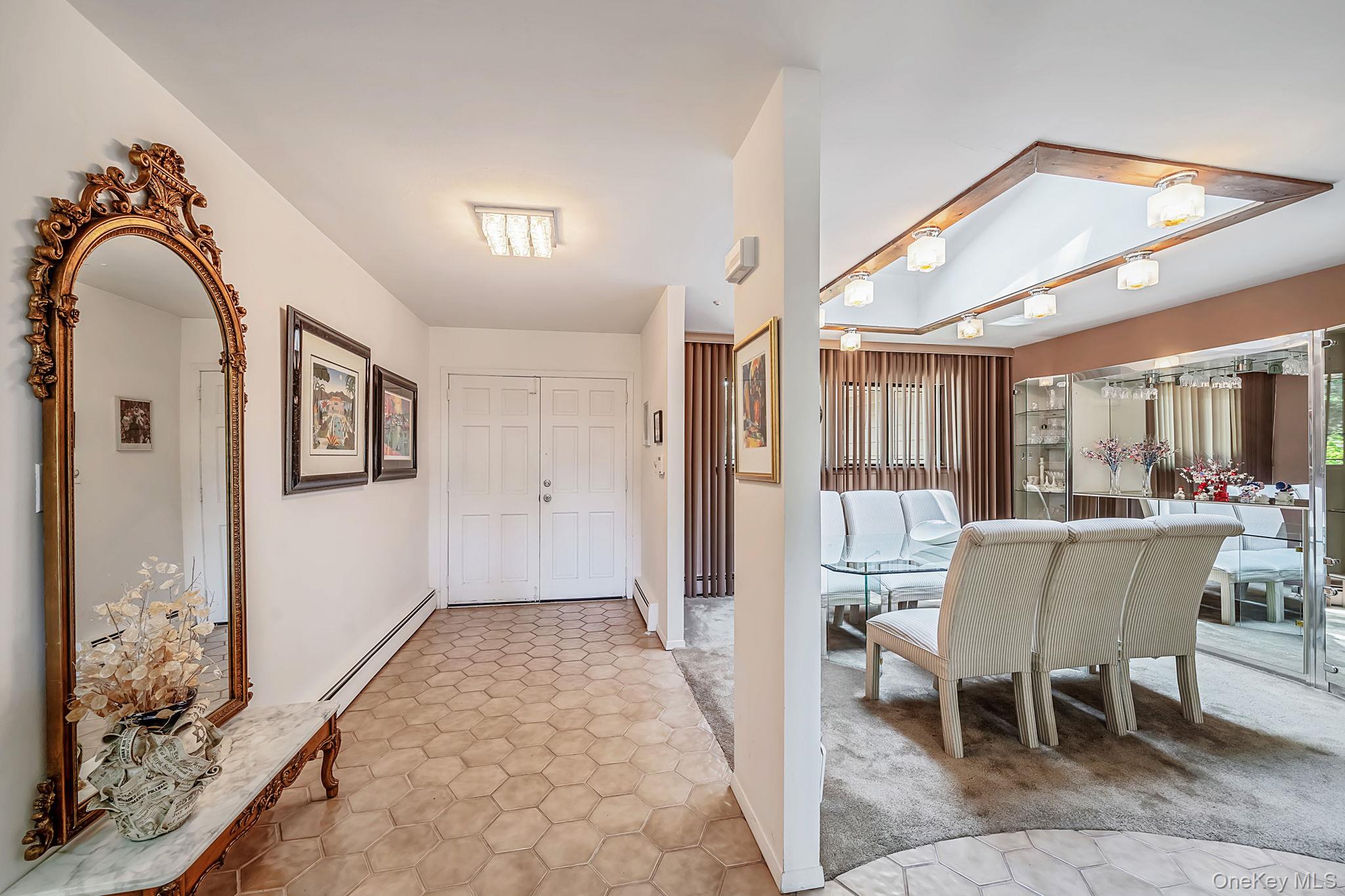 96 Fulton Boulevard Commack, NY 11725 - Photo 9 of 41 a dining room with furniture and window