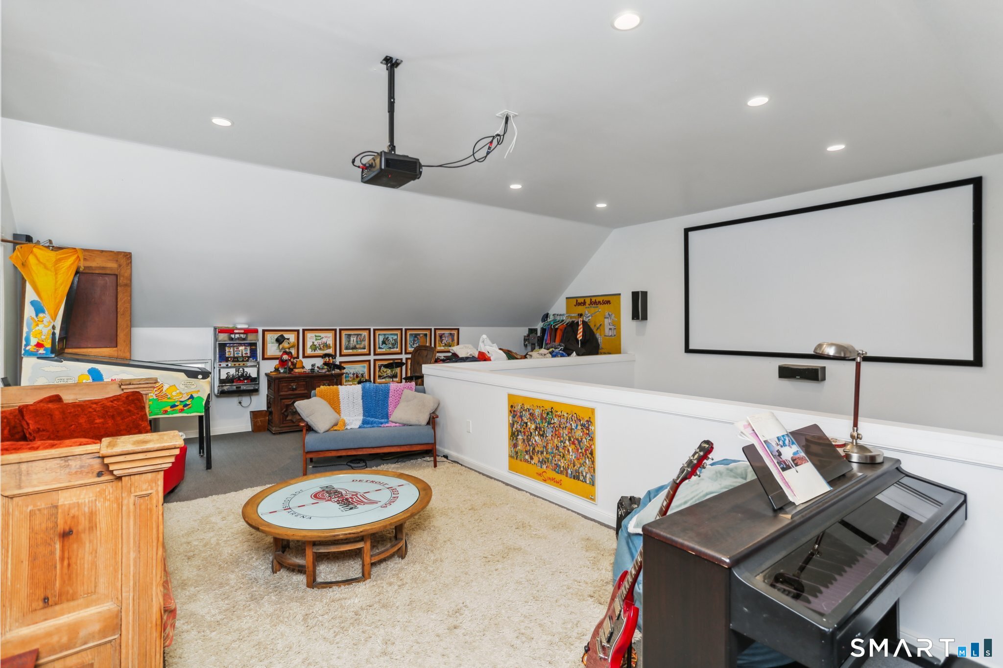 142 Seventy Acre Road Redding, CT 06896 - Photo 16 of 40 a living room with furniture and a flat screen tv