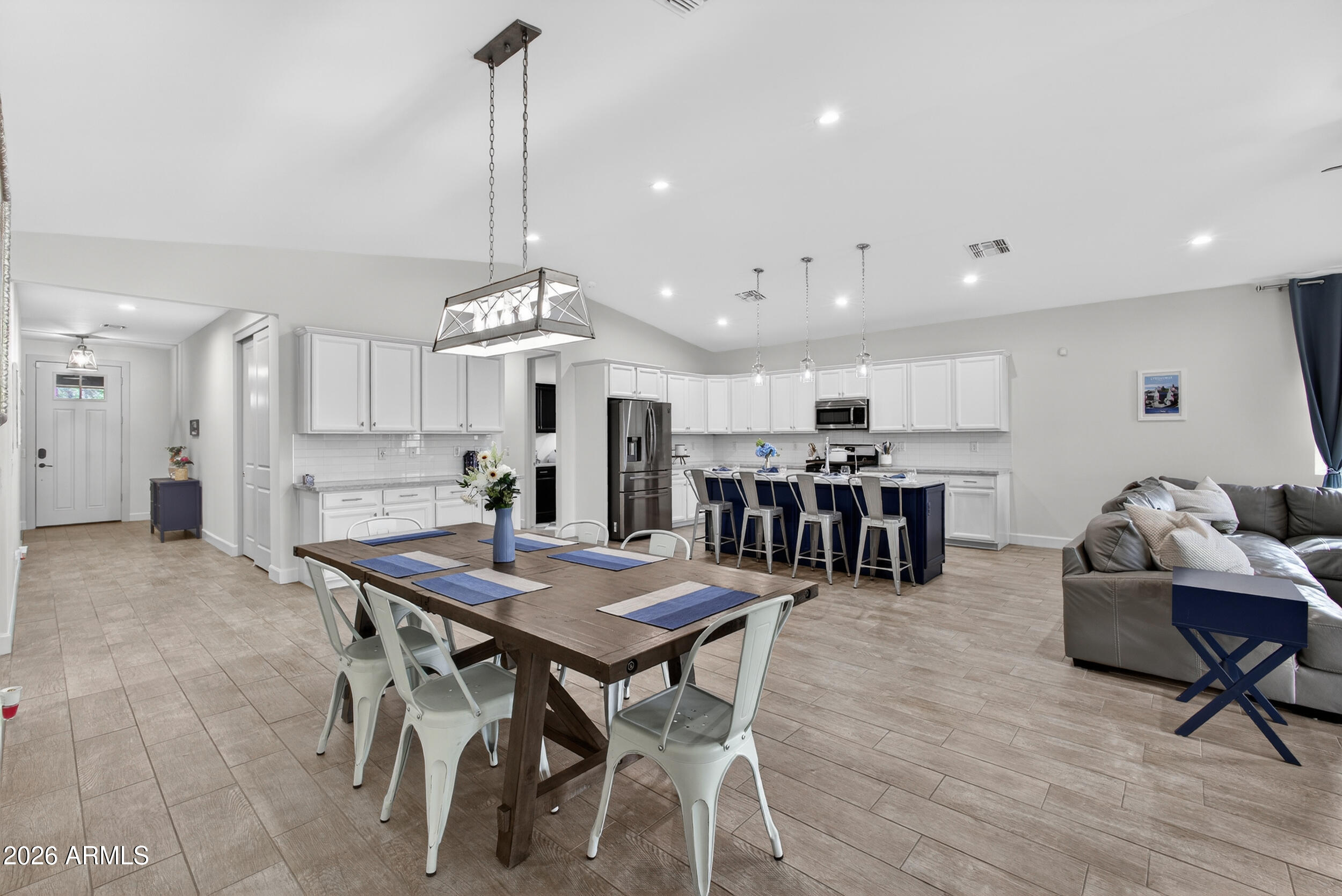 8942 North 15th Lane Phoenix, AZ 85021 - Photo 2 of 39 a view of a dining room with furniture