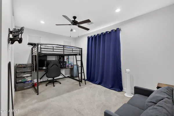 a view of a livingroom with a workspace