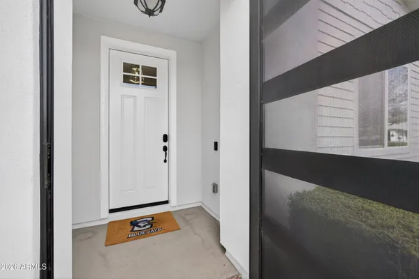 a view of a livingroom with an empty space and window