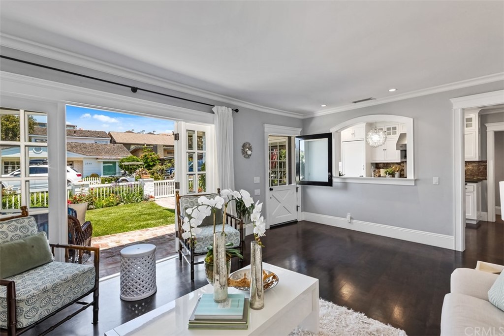 2596 Crestview Drive Newport Beach, CA 92663 - Photo 11 of 54 Living room opens up to the front porch.
