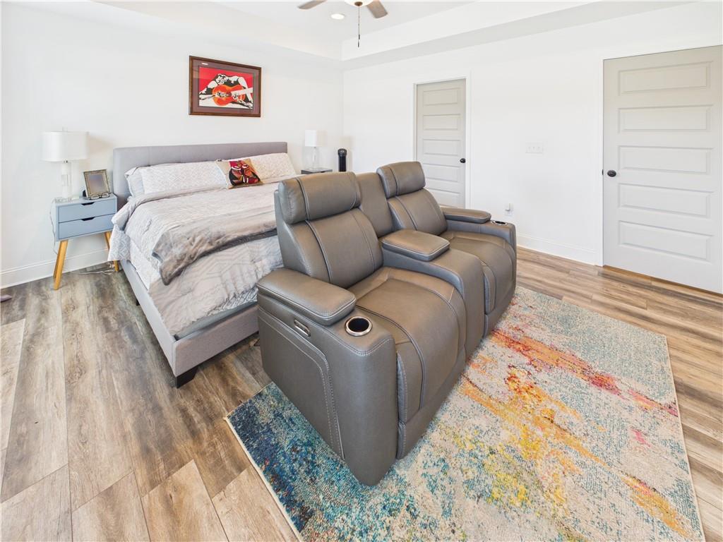 52 Owens Road Fort Mitchell, AL 36856 - Photo 16 of 29 Spacious room featuring wood-finish flooring, white walls, and a recessed ceiling fan