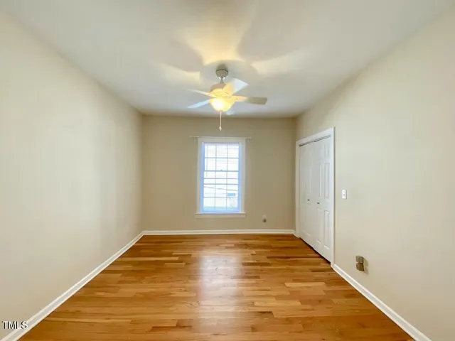 a view of an empty room and window