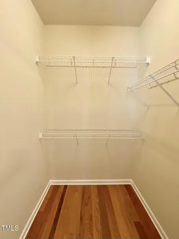 a view of a room with racks on the wall