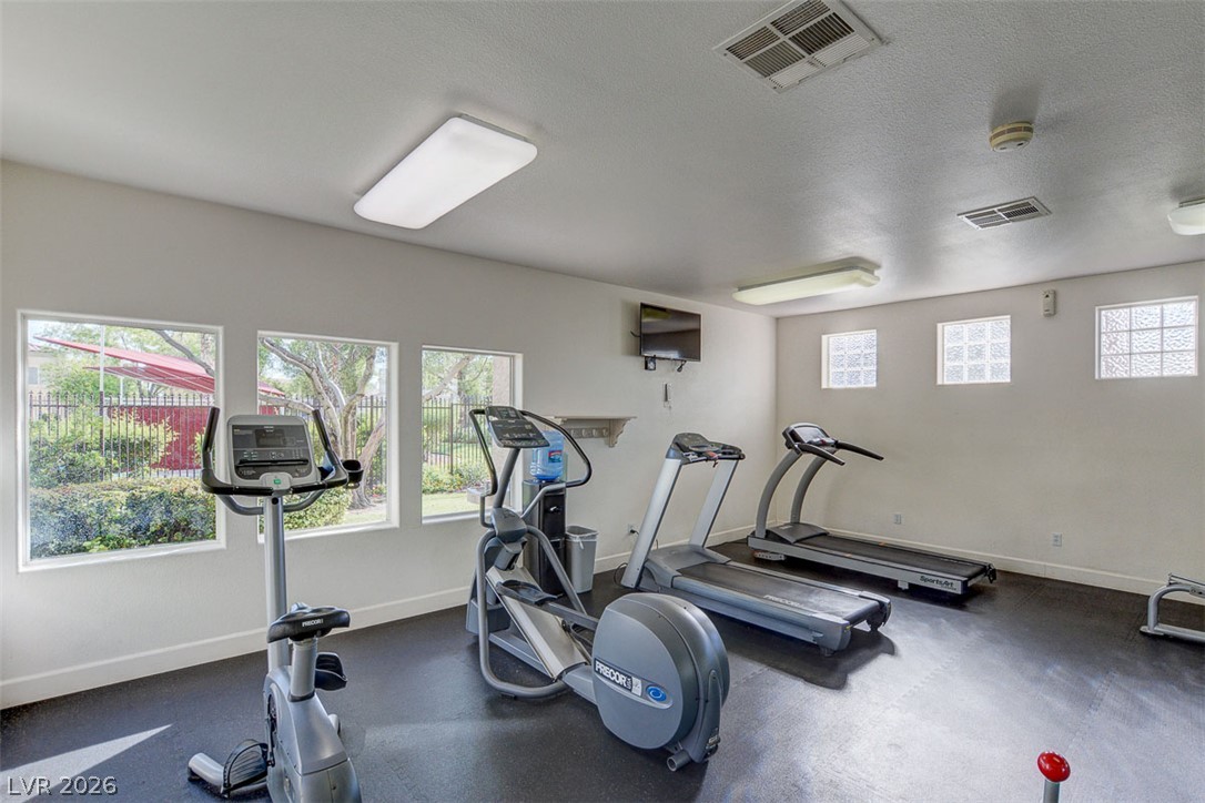 7885 West Flamingo Road, Unit 1050 Las Vegas, NV 89147 - Photo 61 of 62 Well-equipped fitness center offering a variety of exercise machines for residents' convenience.