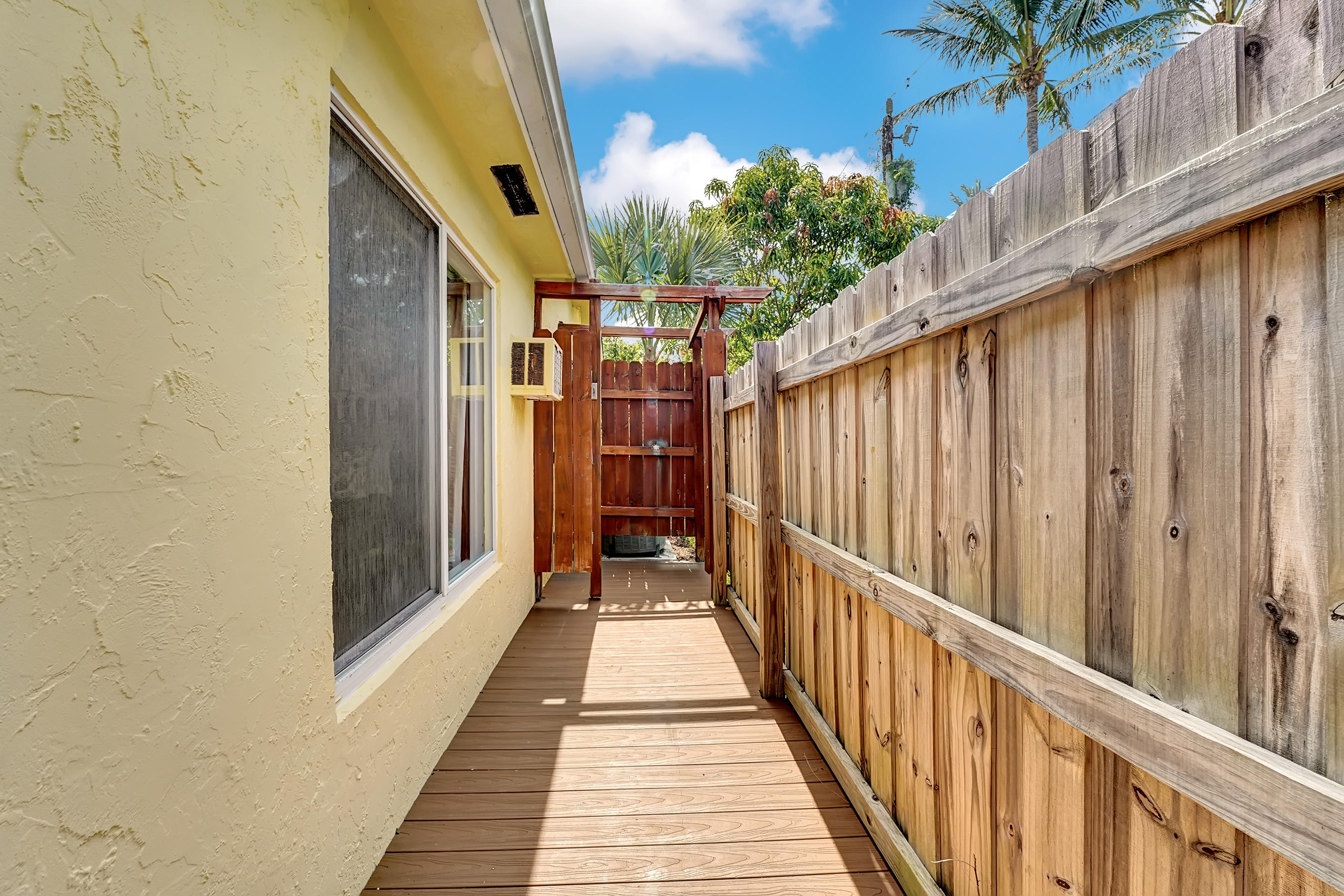 16 Sailfish Lane Ocean Ridge, FL 33435 - Photo 36 of 37 a view of a balcony with wooden floor