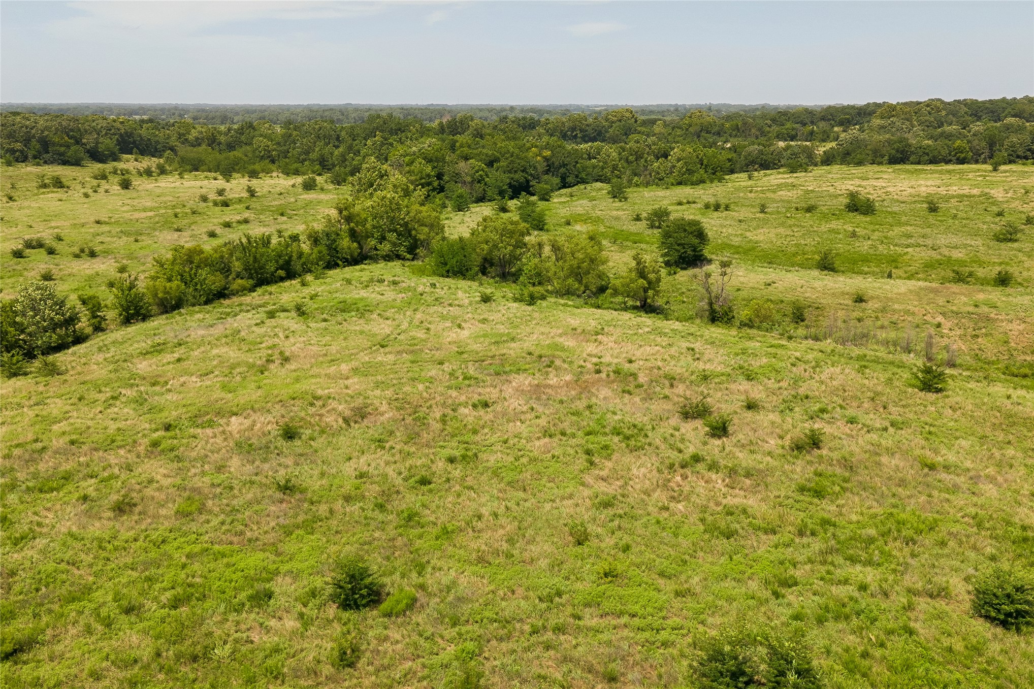 2 West Fern Mountain Road Muskogee, OK 74401 - Photo 38 of 55 Expansive open terrain featuring natural grasses and scattered mature trees