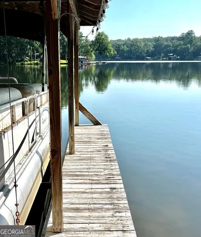 a view of a lake with a outdoor space
