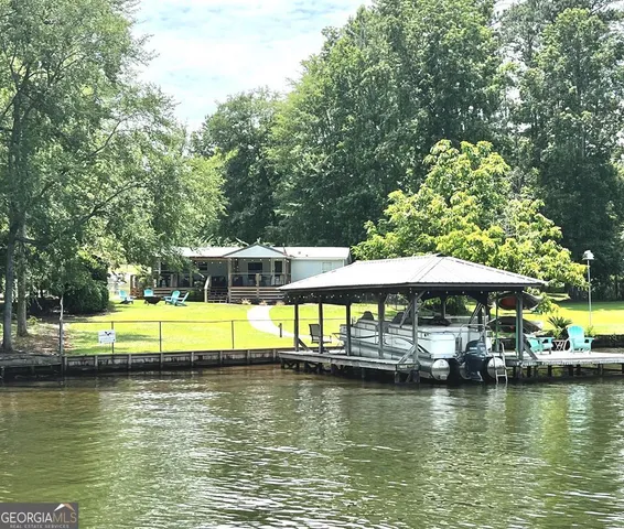 a view of a swimming pool with lounge chairs