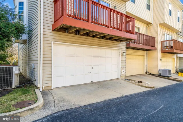 a view of pool with patio