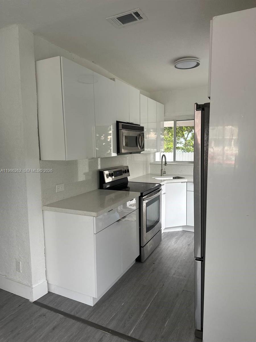 1812 Northwest 64th Street Miami, FL 33147 - Photo 13 of 60