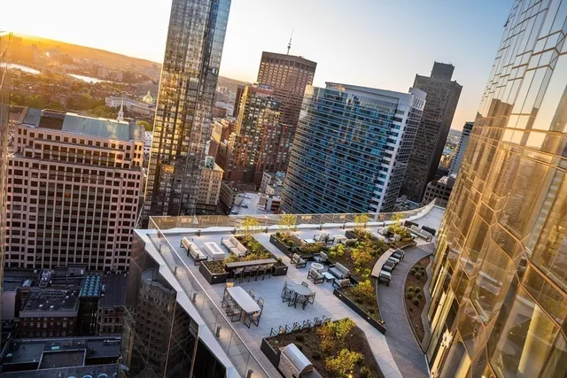 a view of roof with city view