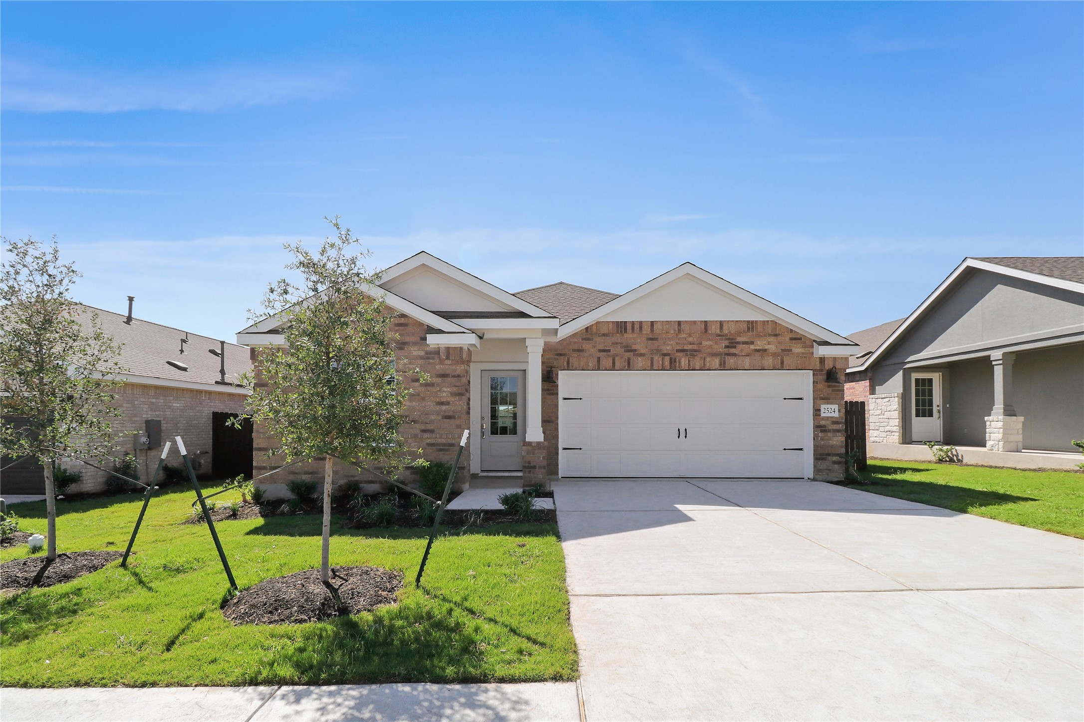 2524 Four Waters Loop Georgetown, TX 78628 - Photo 1 of 36 a view of backyard of the house