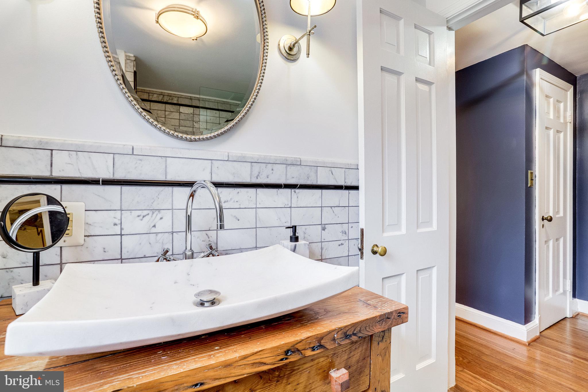 5946 Wilton Road Alexandria, VA 22310 - Photo 62 of 87 Antique sink base + Restoration Hardware fixtures