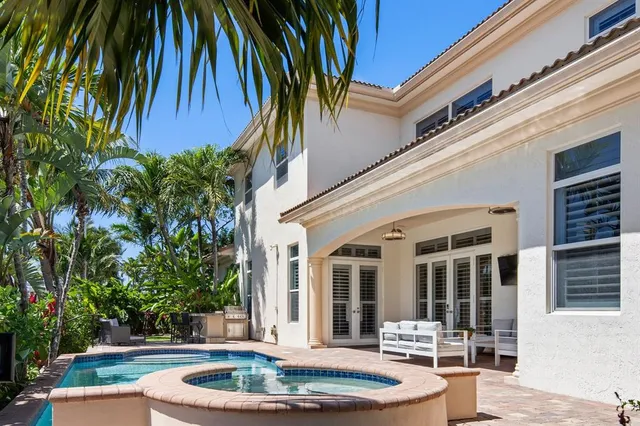 a view of a backyard with a patio