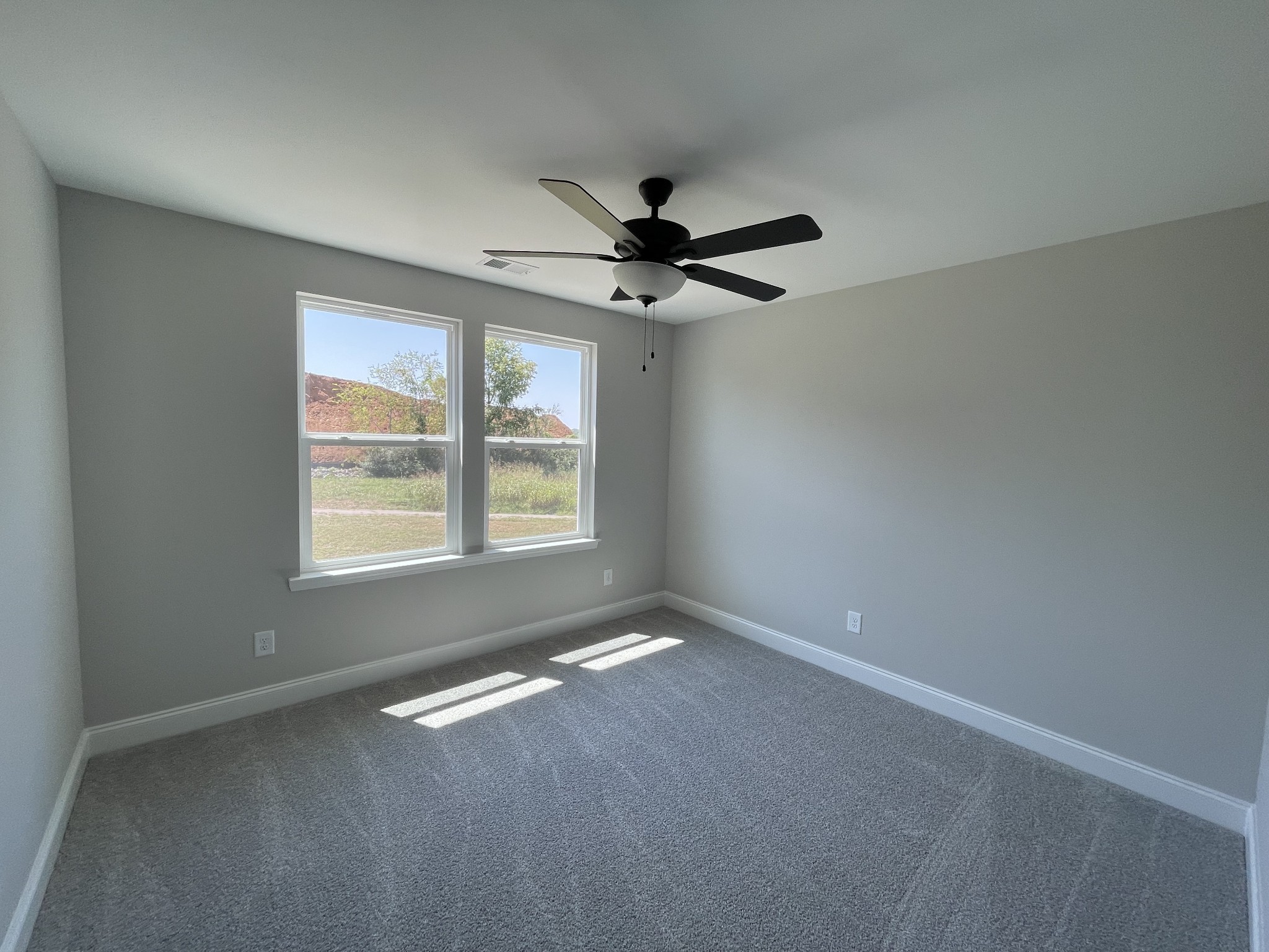 1154 June Wilde Ridge Spring Hill, TN 37174 - Photo 22 of 37 an empty room with a window and a fan