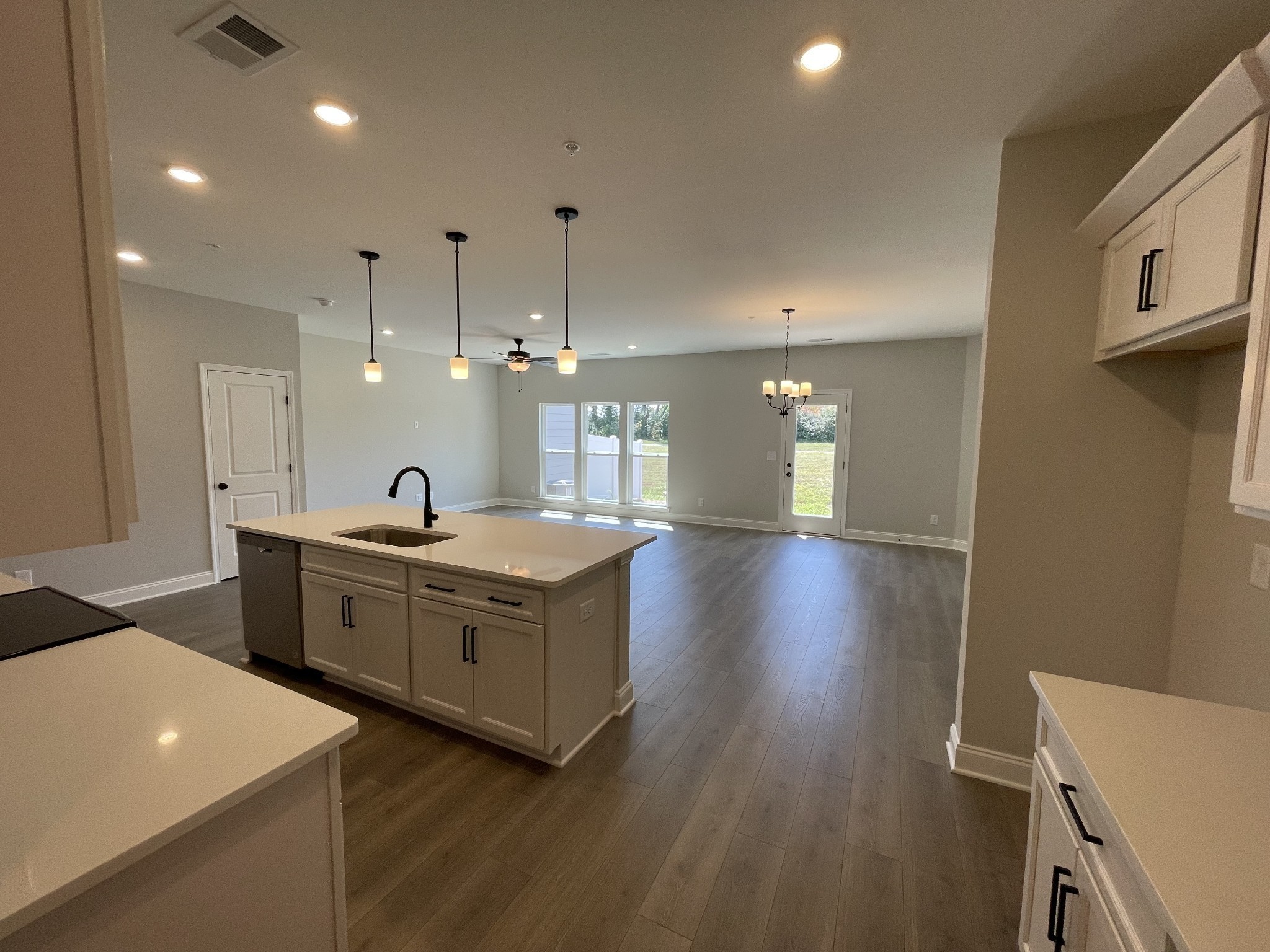 1154 June Wilde Ridge Spring Hill, TN 37174 - Photo 8 of 37 a large bathroom with a large mirror vanity sink and tub