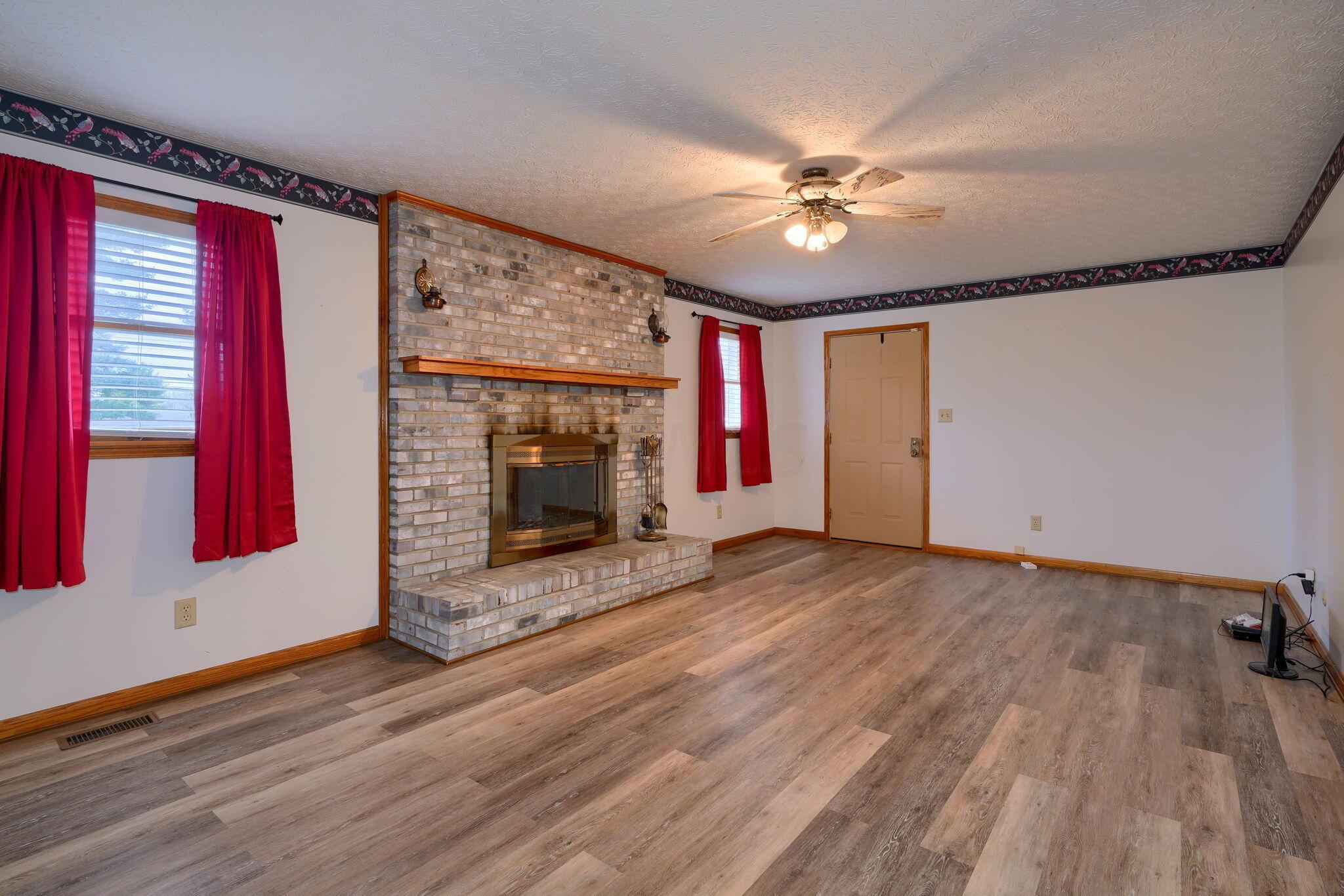 191 Rockwell Road Columbus, OH 43207 - Photo 7 of 28 Family room has custom built wood burning fire place.