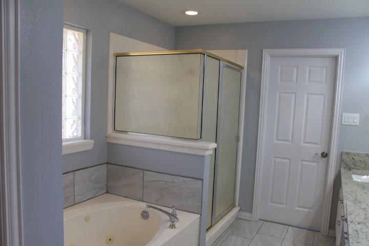 3051 Plainview Road Midlothian, TX 76065 - Photo 6 of 19 Primary bathroom with tub and shower