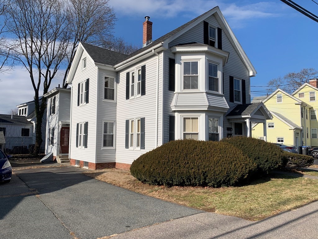 5 Plain Street Natick, MA 01760 - Photo 2 of 31 a front view of a house with a yard