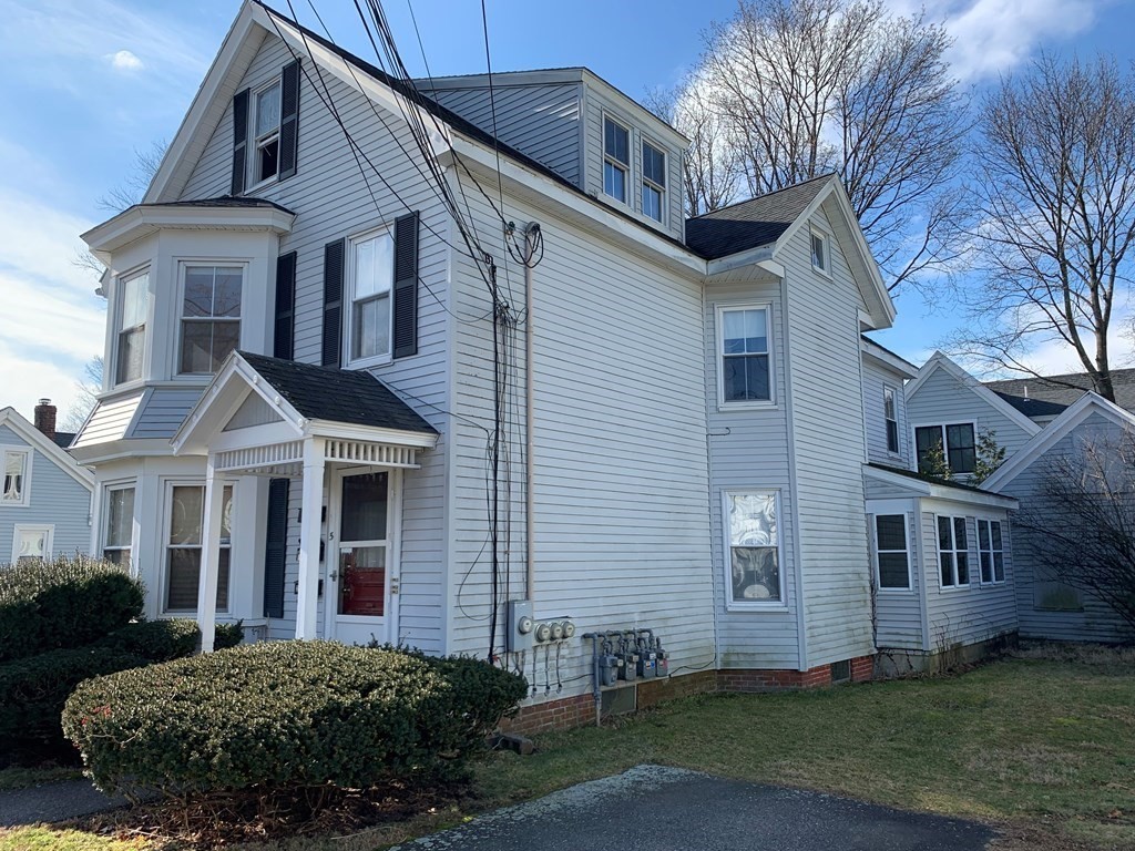 5 Plain Street Natick, MA 01760 - Photo 3 of 31 a front view of a house with a yard