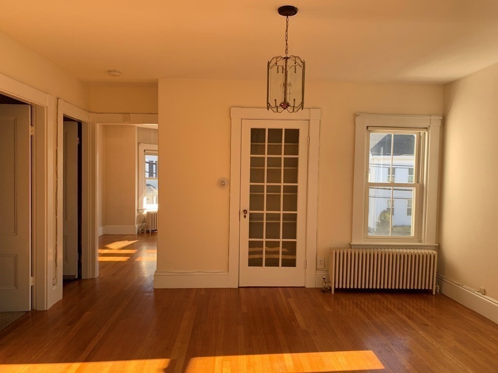 5 Plain Street Natick, MA 01760 - Photo 9 of 31 a view of empty room with windows and entryway