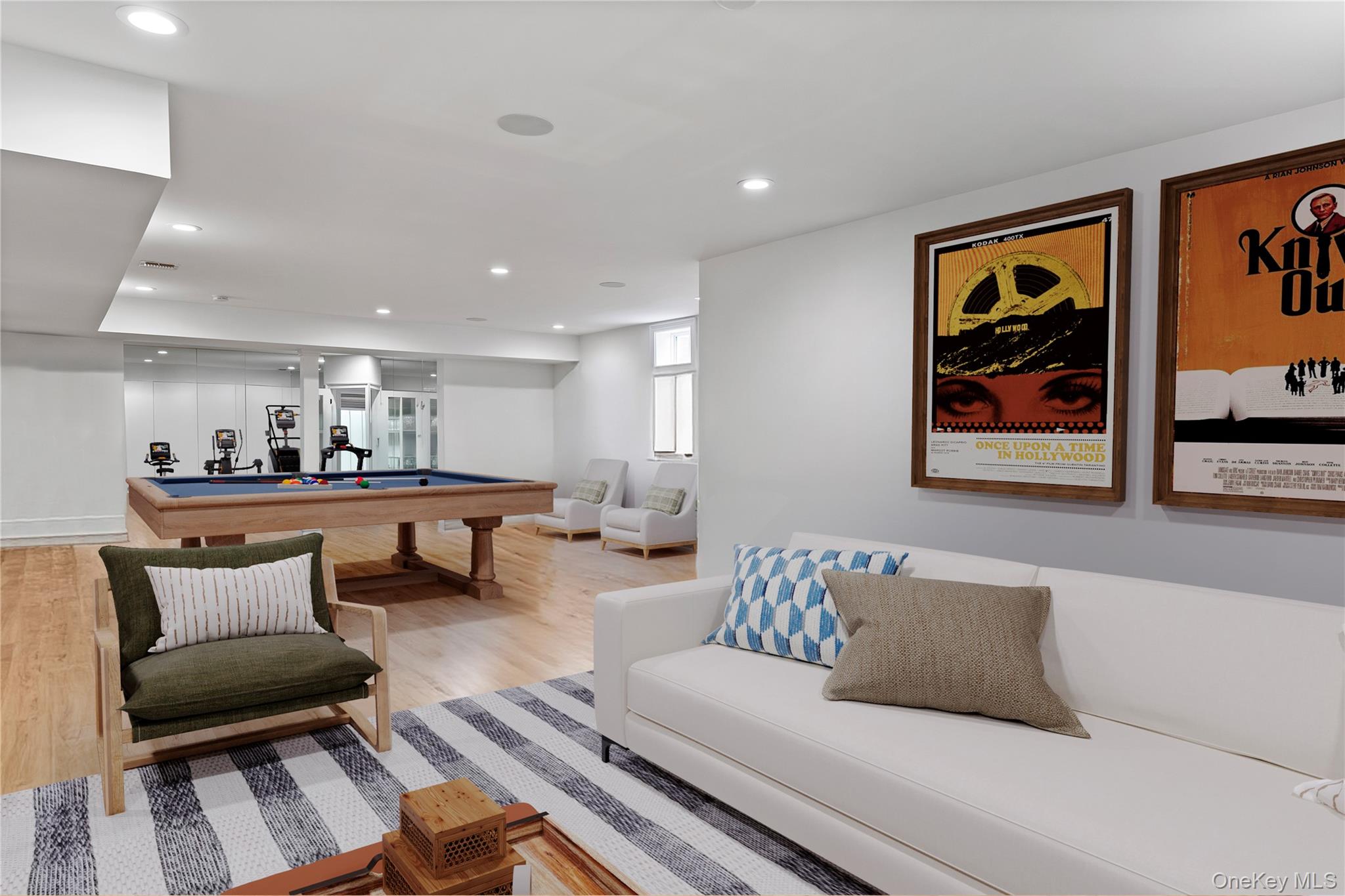 4 Spring Lane Southampton, NY 11968 - Photo 27 of 39 a living room with furniture and paintings on the wall