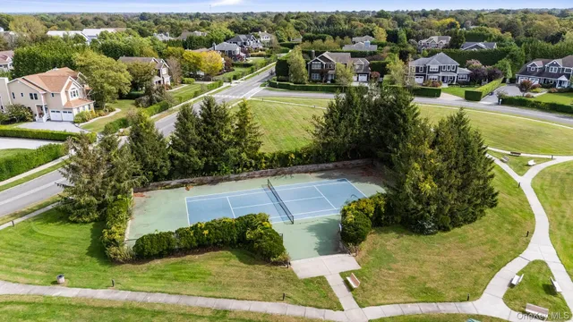 an aerial view of a tennis ground and tennis court