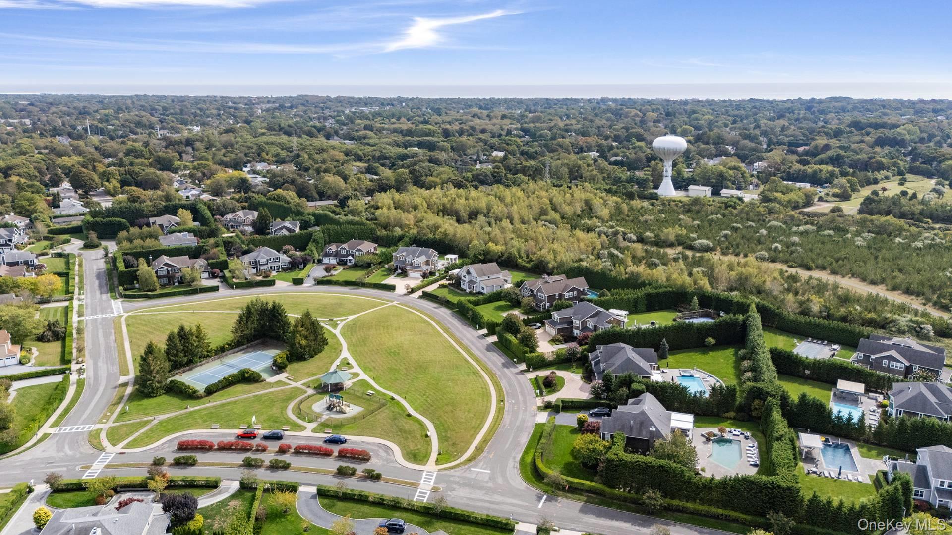 4 Spring Lane Southampton, NY 11968 - Photo 38 of 39 an aerial view of residential houses with outdoor space and parking