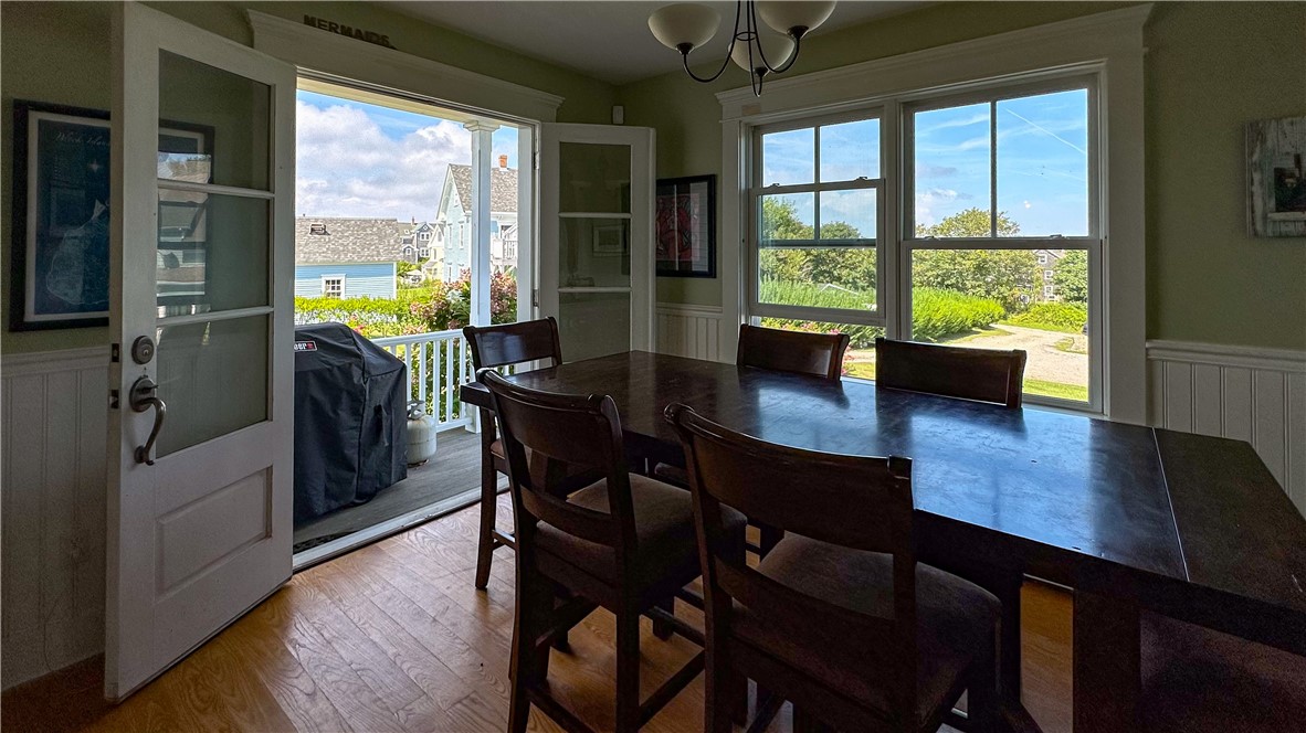 210 Old Town Road Block Island, RI 02807 - Photo 12 of 47 Dining Room with doors to east porch & grill.