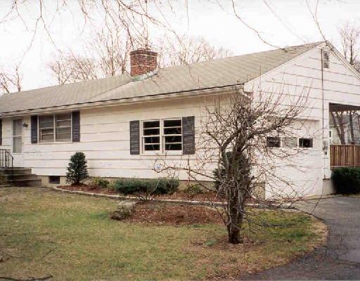 123 Old Saugatuck Road Norwalk, CT 06855 - Photo 1 of 1 a front view of a house with a yard