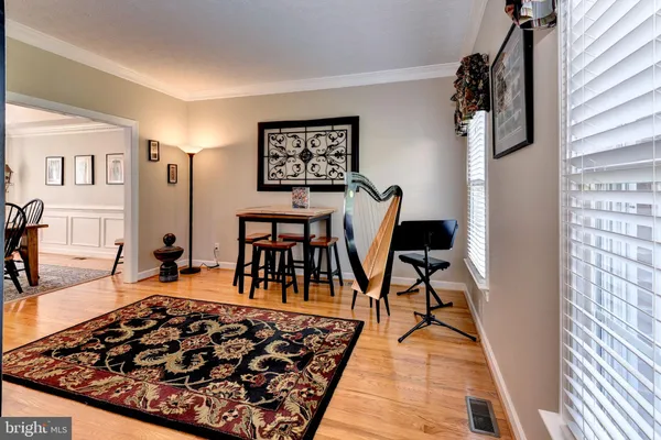a view of a livingroom with furniture and closet