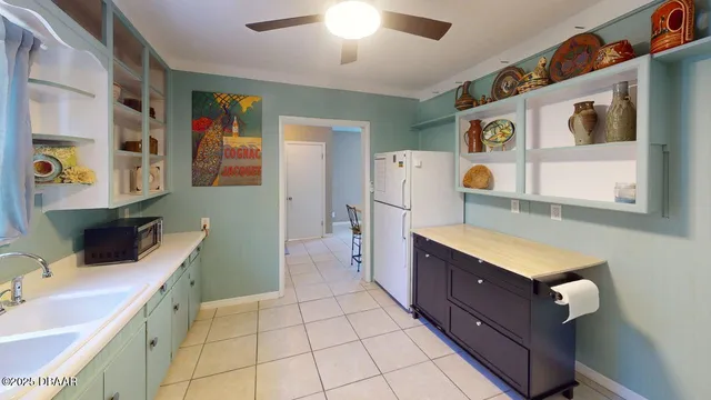 a room with a bed and a mirror