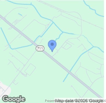 711 Nc Highway Pembroke, NC 28372 - Photo 8 of 8 a view of a wooden wall with a wall