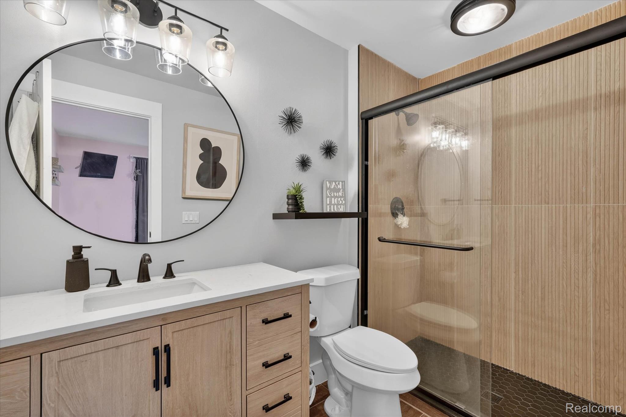 9074 Ridgefield Drive Brighton, MI 48114 - Photo 20 of 75 Full bathroom with vanity and a stall shower