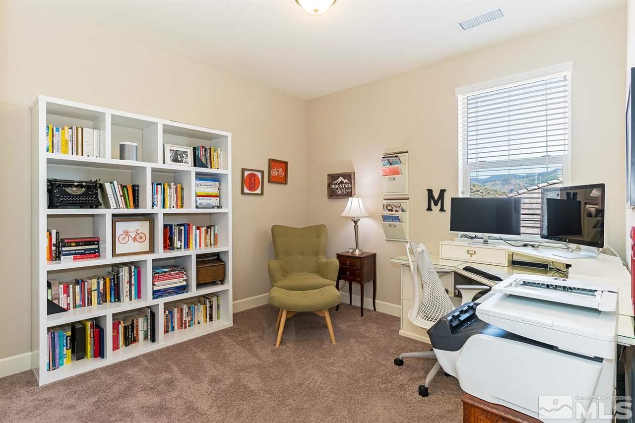 1650 Scott Valley Road Reno, NV 89523 - Photo 13 of 25 a workspace with furniture and a bookshelf