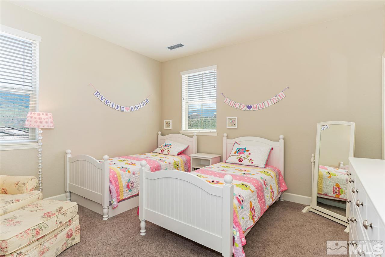 1650 Scott Valley Road Reno, NV 89523 - Photo 14 of 25 a bedroom with a bed and a window