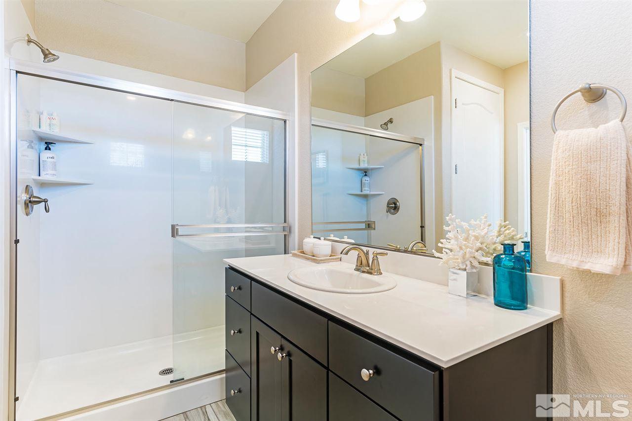 1650 Scott Valley Road Reno, NV 89523 - Photo 20 of 25 a bathroom with a sink and a mirror